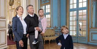 Visitors view the magnificent rooms of Solitude Palace