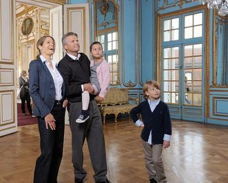 Visitors view the magnificent rooms of Solitude Palace