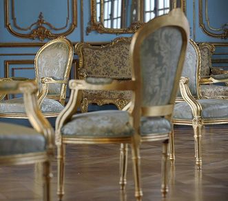 Gilded chairs in Solitude Palace